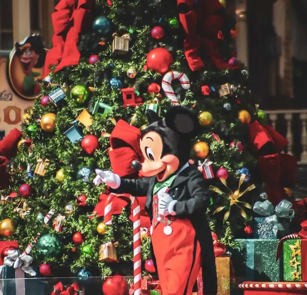 Mickey in front of the Christmas Tree at Disney World